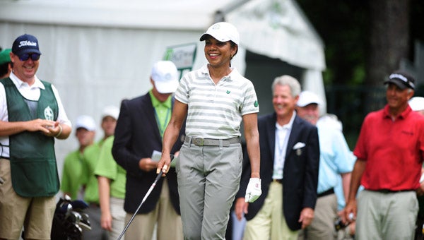 Former Secretary of State Condoleezza Rice smiles as she walks to tee off at the first hole of the Pro-Am round of the Regions Tradition at Shoal Creek on June 5. (Reporter Photo/Jon Goering)