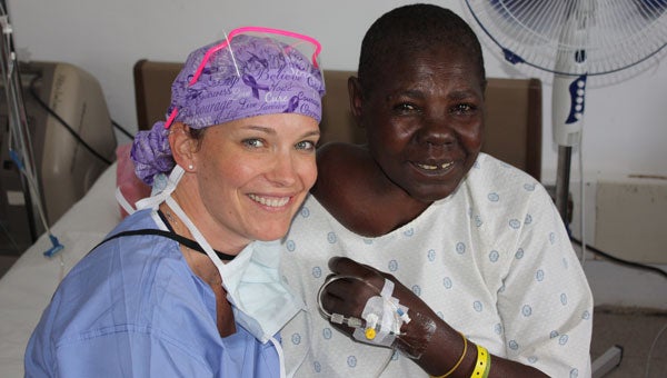 Dena Bedsole, left, with one of her patients in Kenya. (Contributed)