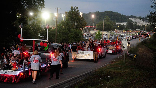 Floats travel down Thompson Road to Larry Simmons Stadium during the Alabaster homecoming parade on Sept. 25. (Reporter Photo/Jon Goering)
