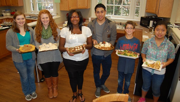 High school and middle school students Rachel May, Maci Poskey, Renita Morrison, Alex Rodriguez, Vincent Orlando and Jessie Zhou won first place in their divisions at the annual Shelby County Cook-off Nov. 22. (Contributed)
