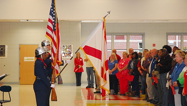 Members of the Thompson High School Junior ROTC present the colors during Meadow View Elementary School's Veterans Day program on Nov. 7. (Reporter Photo/Neal Wagner)