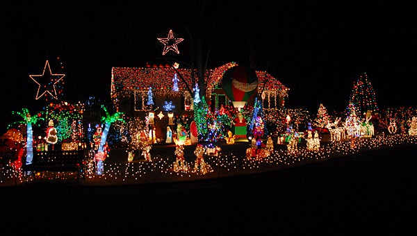 The Phillips family on Red Fox Drive in Pelham have nearly 60,000 Christmas lights in their yard and on their house. (Contributed)