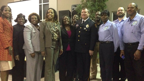 Montgomery Police Department Chief Kevin J. Murphy, center, was the keynote speaker at the Chelsea Citizen Observer Patrol's annual award dinner Feb. 25. (Reporter Photo / Cassandra Mickens)