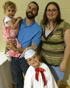 Erin Haynes, right, with children Sara and Erin and husband, Ben. (Contributed)