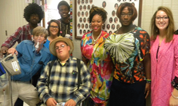 Montevallo High School seniors JD Hanna, Key Bailey, Olivia Lowery, Mayson Sollie, Kenneth McCutcheon, Myia Farrington, Daymon Smith and Katie Hamrick dressed up for “Too Old Tuesday.” (Contributed) 