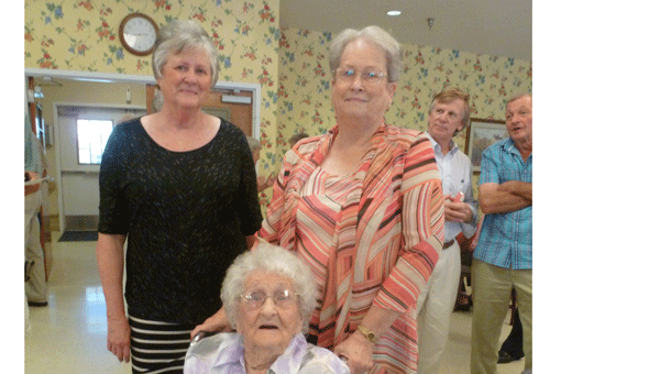 Daughters Agnes Moore Pool and Dean Moore Benson gave a 100th birthday party for their mother Nettie Vonzelle Juzan Moore on August 31, 2014. (Contributed)