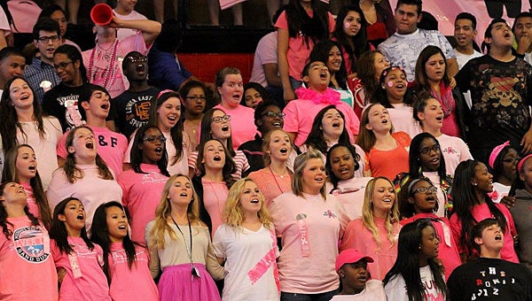 Thompson High School students sing the school's alma mater during a "Pink out" pep rally at the school on Oct. 24. (Contributed/Eric Starling)