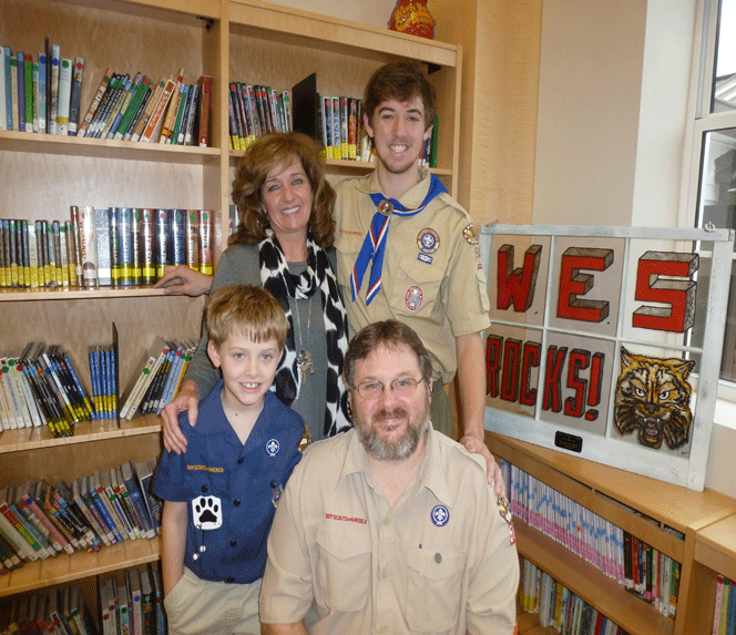 WES Principal Maria Tidmore, the Reece family, Cub Scout Daniel and Cub Master Ron Reece of Pack 588, and Eagle Scout Noah Reece of Troop 588, at Wilsonville Elementary School, where Noah renovated the indoor classroom for his Eagle project. (Contributed)