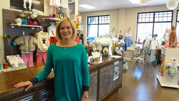 Kim Anderson and her husband became owners of Favorite Laundry, a children's clothing boutique in the Mt Laurel town center, nearly a year ago. (Reporter Photo/Emily Sparacino)