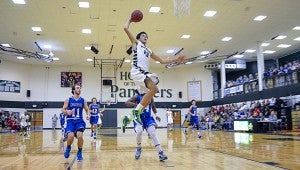 Alex Reese goes up for a dunk in Pelham's game against Chelsea Thursday, Jan. 8. (Contributed Photo/ David Jacks) 