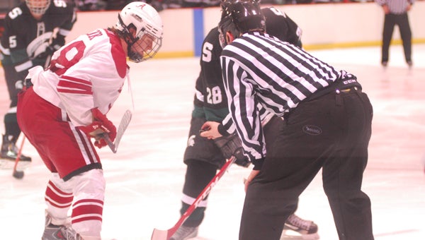 Clay Link, left, of the Alabama Frozen Tide faces off against Thomas Ebbing of Michigan State in their first round March 10 ACHA Division III Championship game. (Reporter Photo / Baker Ellis)