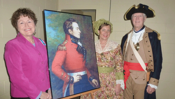Col. Larry Cornwell, USAF retired, with wife Leanne portrayed Rev. War hero and wife, Gen. and Mrs. Richard Montgomery, at the recent DAR David Lindsay Chapter. Pictured are Regent Margaret Clark, portrait of Gen. Montgomery, Col. Larry and Leanne Cornwell. (Contributed) 
