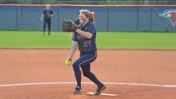 Ashlee Sanders of Oak Mountain unloads a pitch during their March 24 game against Hillcrest. The Lady Eagles lost by a final score of 8-4. (Reporter Photo / Baker Ellis)