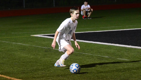 Austin Jemison and the Chelsea soccer Hornets upset Pelham on April 14 by a come-from-behind 3-2 final. (Reporter Photo / Baker Ellis)