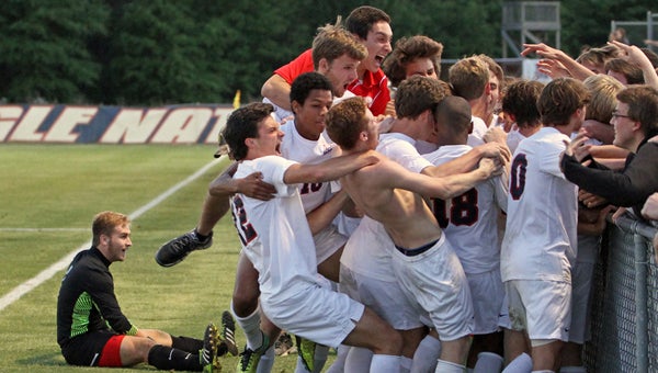 The Oak Mountain boys soccer team beat Vestavia Hills in the first round of the 7A state tournament on April 28 by a score of 2-1. (Contributed / Omhsboyssoccerphoto.com)