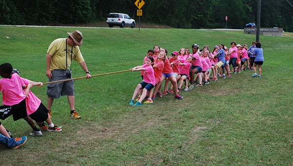 HIS students compete against each other in a tug-of-war contest at H-Day on Friday, May 15. (Reporter Photo/Graham Brooks)