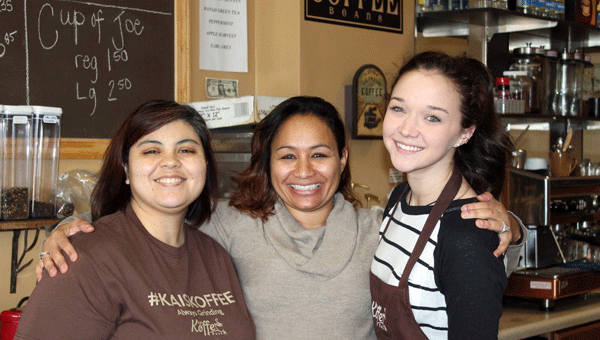 Kai Smith, center, with some of the smiling faces you might find serving you new lunch options at Kai’s Koffee in Pelham. (Contributed) 