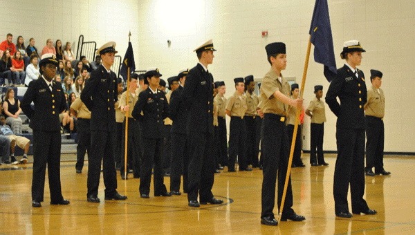 Cadets at Parade Rest stand at the Activation Ceremony held at Calera High School in front of the student body and guests. Cadet Lieutenant Junior Grade Julia Grooms, NJROTC Commanding Officer, stands at front of the units. (Contributed)