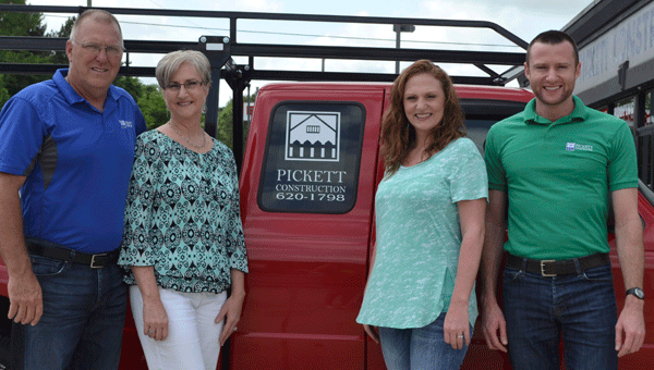 Alabaster residents Ricky and Cindy Pickett, far left, opened Pickett Construction in 2002. Also pictured are their children, Leah and Josh. (Contributed)