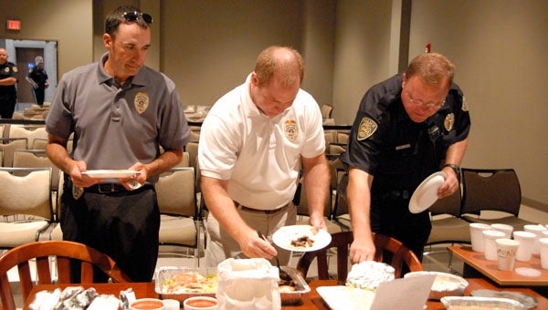 RealtySouth’s Marilyn Seier decided to provide meals for Pelham Police Department’s three shifts on June 16. (Reporter Photo / Jessa Pease) 