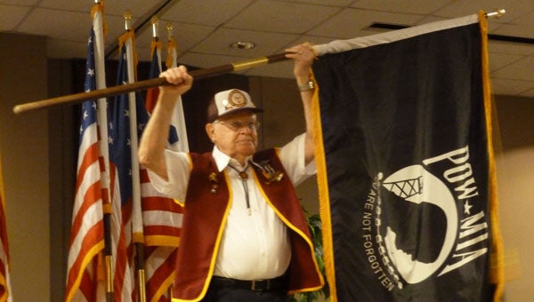Korean War veteran Newton Duke carried the POW/MIA flag at the Seventh Annual Flag Day, sponsored by the City Of Pelham and Cahaba Valley Elks Lodge 1738. Corp. Duke, U.S. Army, served in the 23rd Infantry, 2nd Division, I Company and was captured by the Chinese on May 18, 1951. He was a POW for 27 months until his release on Aug. 13, 1953.