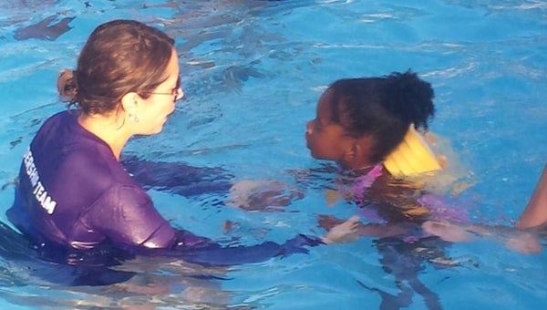 A Life guard give swim lessons at the Pelham YMCA aquatics division. (Contributed)
