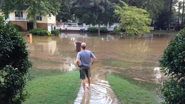 When it rains heavily, Chris Conner said it’s like a river flowing through the road and his front yard spanning several houses. (Contributed)