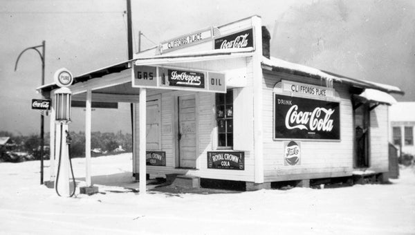 Clifford’s Place. Obviously a forerunner of today’s convenience store, Clifford’s Place offered one grade of gasoline and a variety of soft drinks. A Royal Crown Cola and a Moon Pie were in high demand at the store located at the intersection of County Road 52 and Main Street, now the Baptist Church parking lot. The store was a popular hangout for the town’s young people. (Contributed/City of Helena Museum)