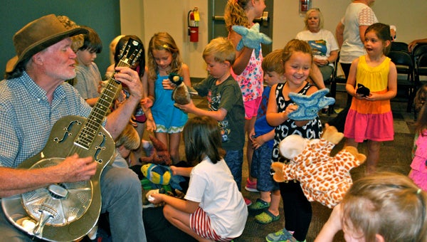 The North Shelby Library celebrated the Summer Reading Program participants with a party with storyteller Mr. Mac on July 22. (Reporter Photo / Molly Davidson)