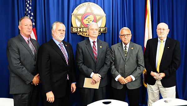 From left, Roger Beaupre, Larry Strayer, Jim Dormot, Ray White and Larry Rooker are members of the Shelby County Sheriff's Office Cold Case Unit. Not pictured is member Alton Sizemore. (Reporter Photo/Neal Wagner)