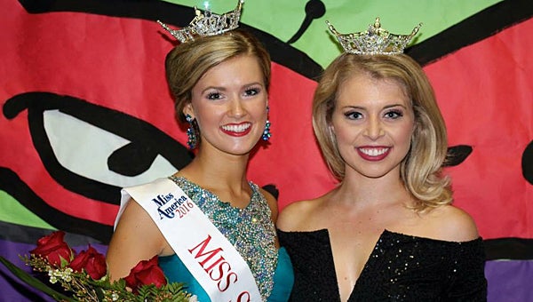 Helena resident Amanda Ford, right, passes her crown to new Miss Shelby County Hayley Barber. (Contributed)