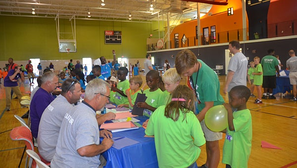 Hundreds of Birmingham-area YMCA kids, some of who came from the Alabaster YMCA and Hargis Retreat Camp in Chelsea, enjoy the Thingamajig Convention in Birmingham on July 30. (Reporter Photo/Jennifer Bailey)