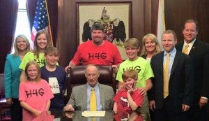 The Griffin family joined Gov. Robert Bentley, family friend Michael Staley, state Sen. Cam Ward and state Rep. April Weaver to celebrate the passage of Gabe's Right to Try. 