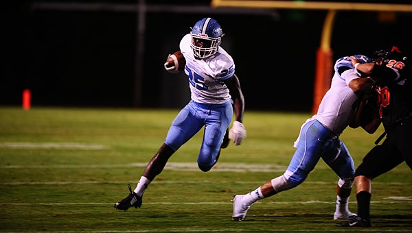 Spain Park's Larry Wooden (25) breaks free for a first down during the Jaguars' 38-35 loss to Austin in Decatur on Aug. 21. (Reporter Photo/Neal Wagner)