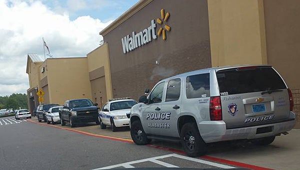     Alabaster Police Department vehicles line the front of the Alabaster Walmart as they investigate a bomb threat on Aug. 20. (Contributed/Kayla Dawn)
