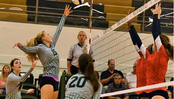 Sophomore Emorie Long, 15, takes a shot at the ball against the Oak Mountain Eagles Sept. 15. (Contributed)