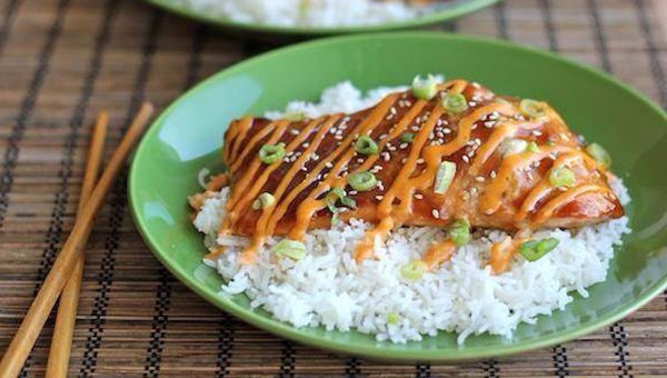 Katie's Plates delivers fresh, made-from-scratch meals right to your door. Pictured is teriyaki salmon with sriracha cream sauce over jasmine rice. (Contributed)