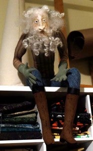 Old Man Winter perches above Hiott's extensive collection of fabrics. 