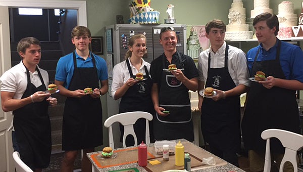 Students in the Kingwood Christian School culinary arts class show off their creations. (Contributed)