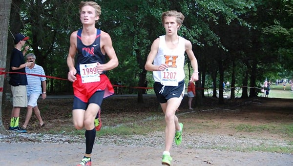 Oak Mountain's Cole Stidfole, left, currently has the fastest 5K time in the state and leads 20 Shelby Count runners who have top-25 fastest times in either the freshman, sophomore, junior or senior class. (Contributed)