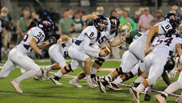 Wyatt Legas reads the defense during Oak Mountain's 21-14 Oct. 9 win over Mountain Brook. (Contributed / Barry Clemmons)