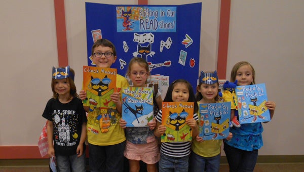 On Nov. 16, which is Button Day, children can read "Pete the Cat and His Four Groovy Buttons." (File)