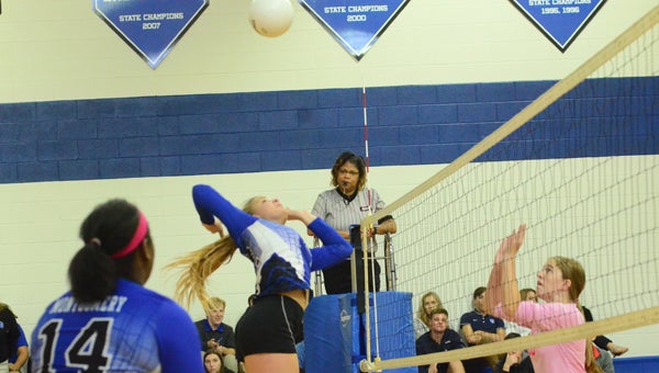 Natalie Watts of Kingwood goes up for a kill in the Lady Lions' Oct. 19 AISA 2A Elite Eight matchup against Fort Dale. Kingwood won in three sets. (Reporter Photo / Baker Ellis)