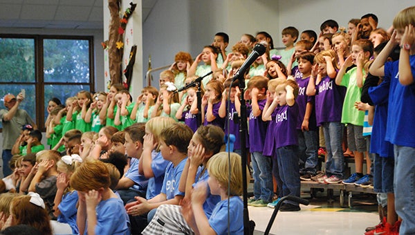 Helena Elementary School first graders perform one of their songs during their fall musical performance on Tuesday, Oct. 6 in the school cafeteria. (Reporter Photo/Graham Brooks)
