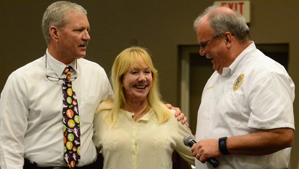 Pelham Mayor Gary Waters, Debbie Grebel and Pelham Police Chief Larry Palmer discuss Palmer’s upcoming role of Mother Ginger in “The Nutcracker.” (Reporter photo / Jessa Pease) 