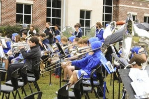 The Chelsea High School Band performed throughout the morning and afternoon of Oct. 3 at Chelsea Day, the proceeds of which help cover the cost of uniforms, instruments and music for band members. (For the Reporter/Dawn Harrison)