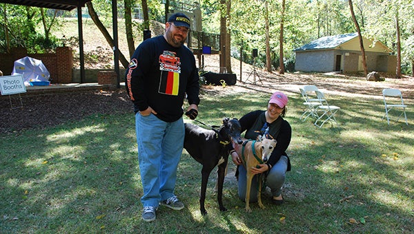 Pictured are Sean and Natasha Yoder with their two greyhounds Beans and Fred at Helena’s Barktoberfest. (Reporter Photo/Graham Brooks) 
