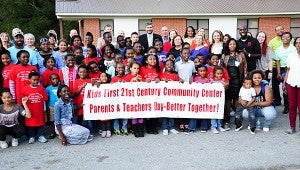 Members of Alabaster’s Kids First Awareness Community Learning Center join together for a day of celebration on Oct. 22. (Reporter Photo/Neal Wagner)