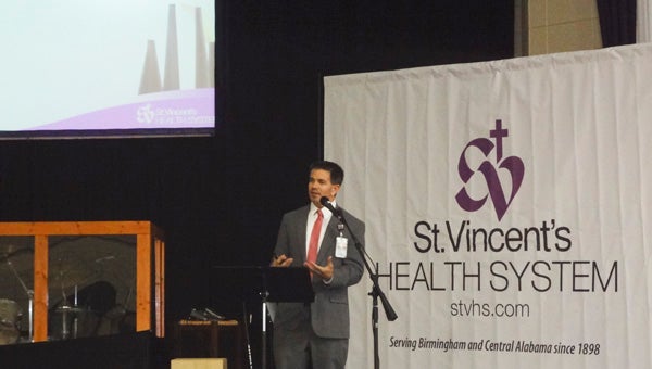 Brian Massey, administrative director of business development for St. Vincent's Health System, talks to South Shelby Chamber of Commerce luncheon attendees Oct. 1 about the St. Vincent's One Nineteen expansion and changes in the healthcare industry. (Reporter Photo/Emily Sparacino)