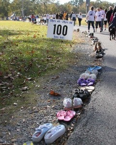 This year, 721 shoes will line the walk route, symbolizing the number of lives lost to suicide in Alabama in 2013. (Contributed)